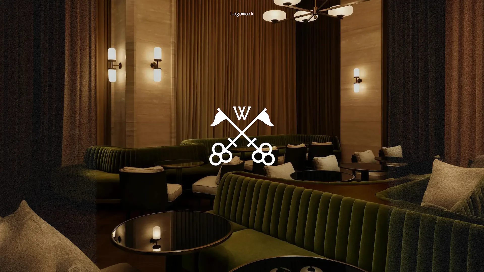 Lakeside boutique hotel with modern architecture, scenic views, and cozy outdoor seating by the water.