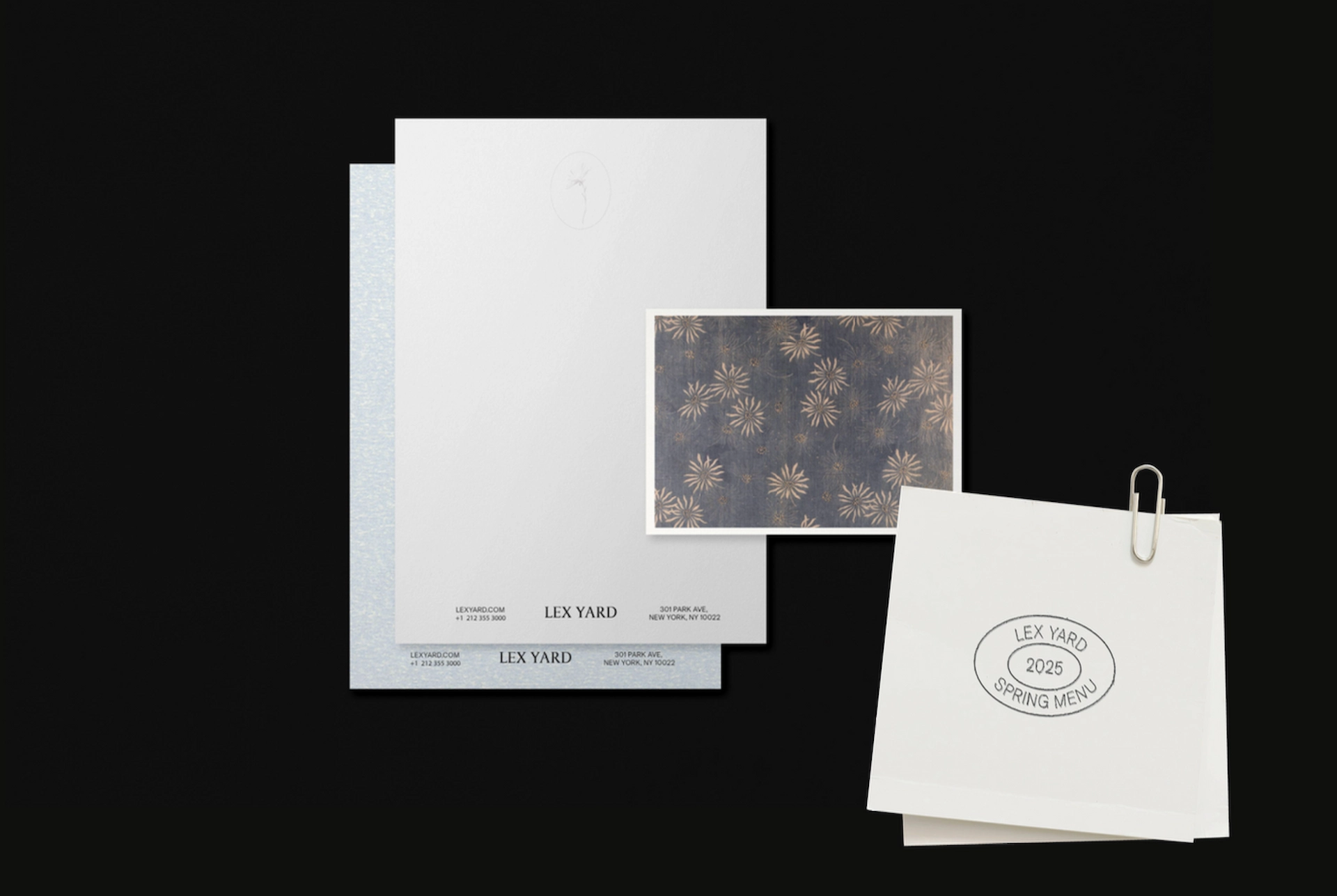 Branded LEX YARD stationery on black background, including letterhead, floral card, and clipped spring menu.