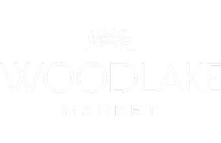 Branding by Spherical 10 Woodlake Market logo with white text and leaf icon on black background.