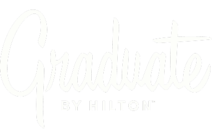 White “Graduate by Hilton” logo on a black background.
